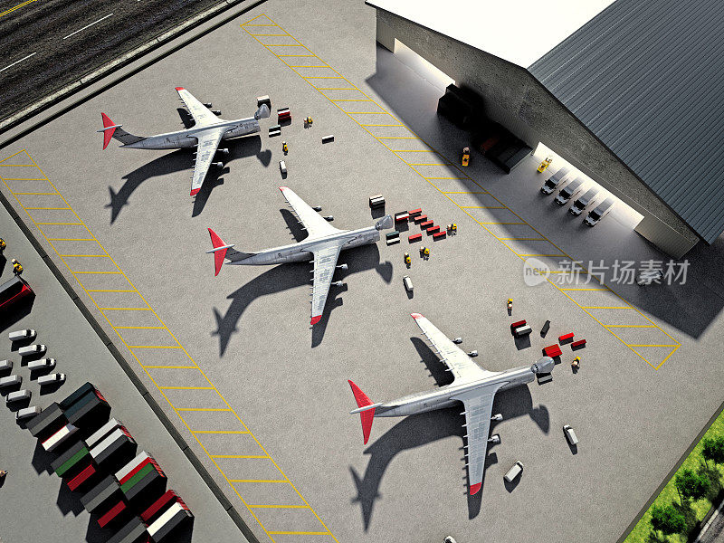 Cargo airplanes being loaded in front of a commercial depot/warehouse. Air transportation and logistics concept